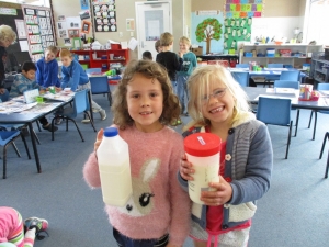 Ayla and Ellie with our milk samples.